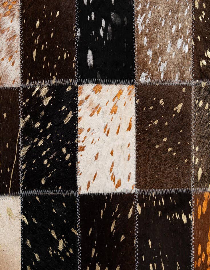 Detail image of  4' 11 x 7' 10 Cowhide - Patchwork Rug