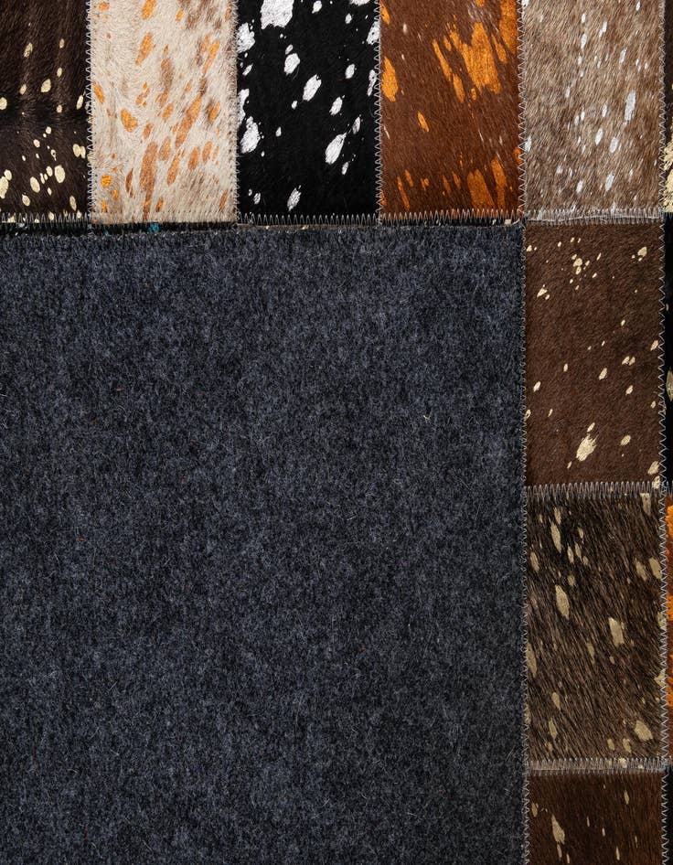 Detail image of  4' 11 x 7' 10 Cowhide - Patchwork Rug