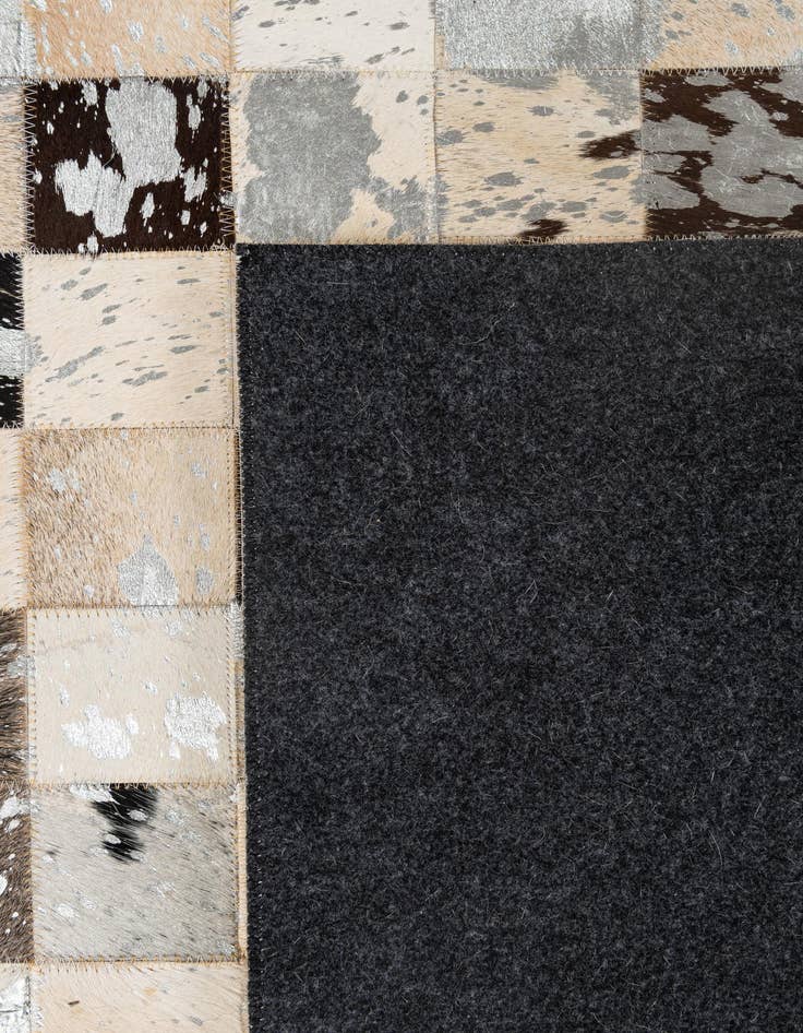Detail image of  5' 1 x 7' 11 Cowhide - Patchwork Rug