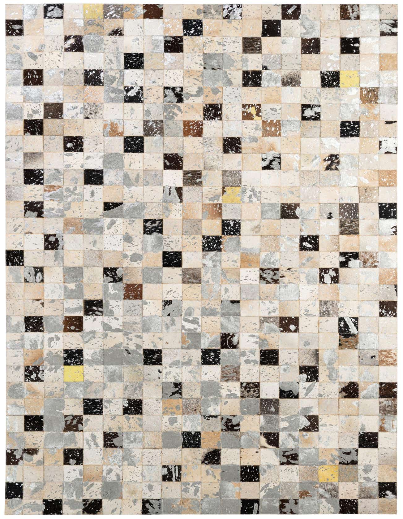 A 5x8 rectangular patchwork cowhide rug with multi-colored squares in shades of black, brown, white, gray, and hints of yellow.