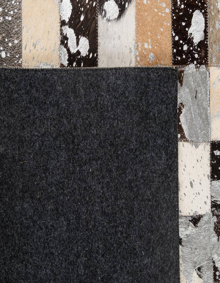 Detail image of  5' 1 x 8' Cowhide - Patchwork Rug