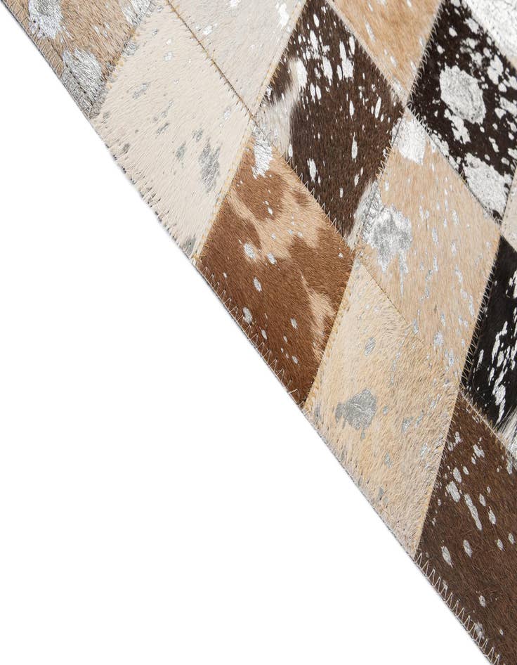 Detail image of  5' 1 x 7' 11 Cowhide - Patchwork Rug