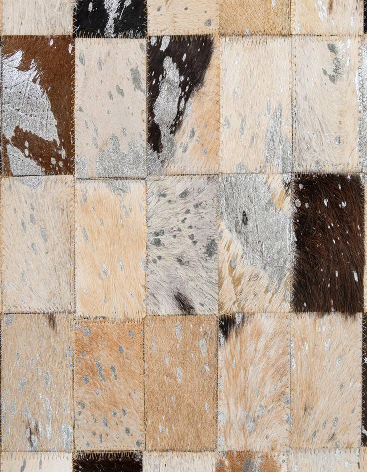 Detail image of  5' 1 x 7' 11 Cowhide - Patchwork Rug