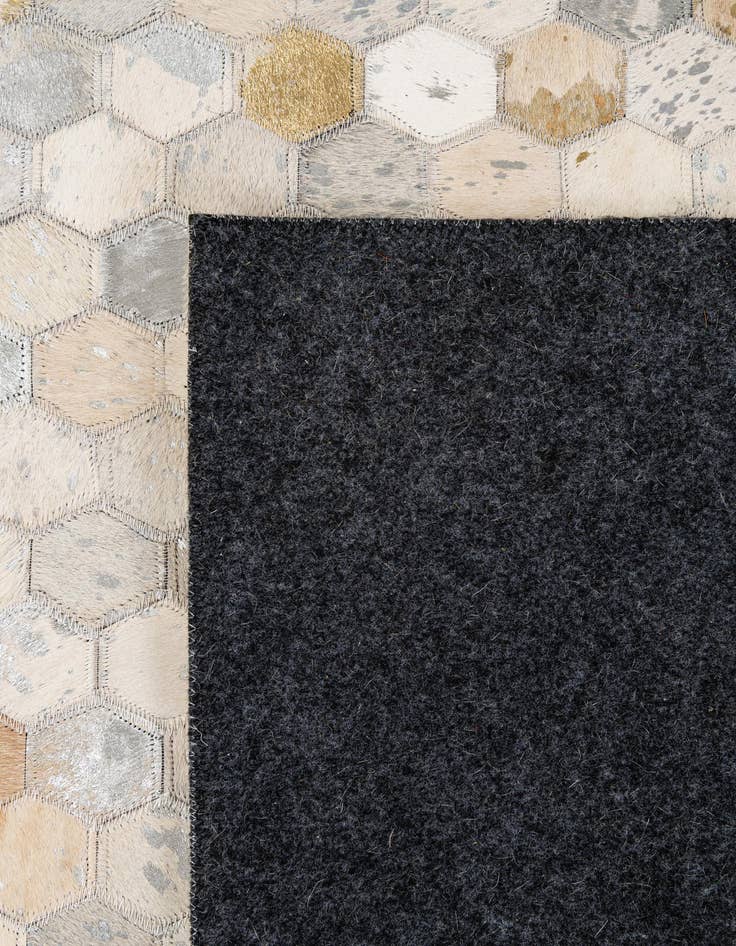 Detail image of  5' 2 x 8' 1 Cowhide - Patchwork Rug