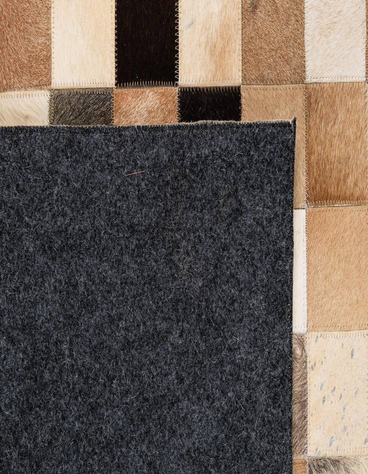 Detail image of  5' 1 x 8' 1 Cowhide - Patchwork Rug