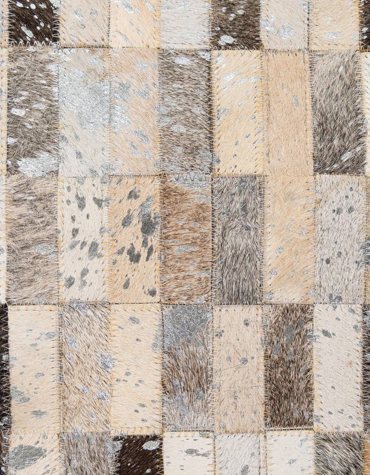 Detail image of  5' 1 x 7' 11 Cowhide - Patchwork Rug