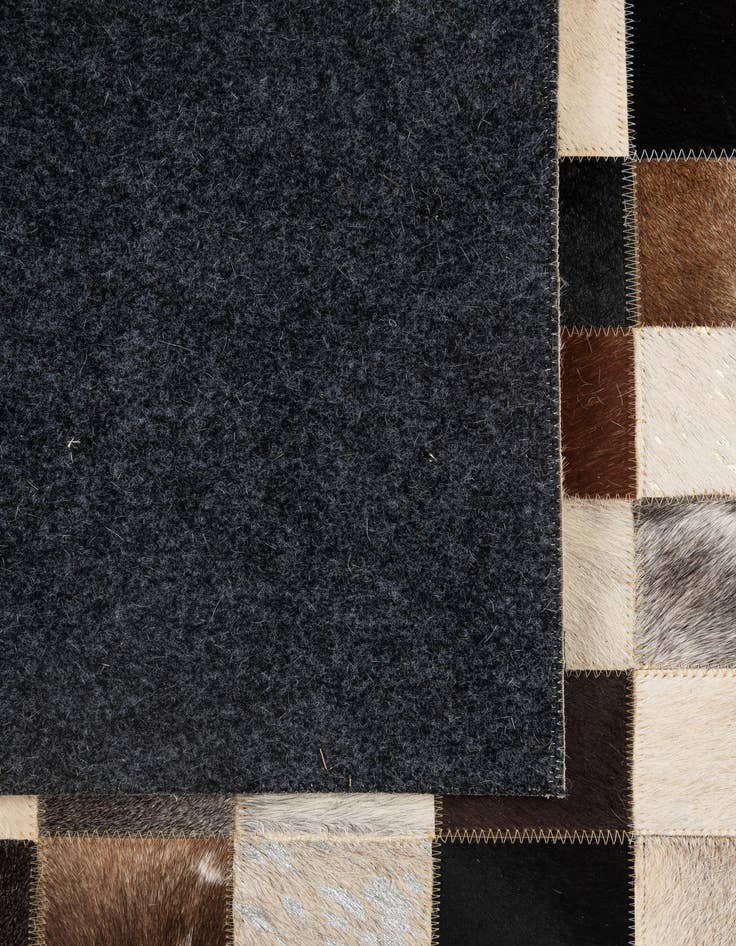 Detail image of  5' 1 x 8' Cowhide - Patchwork Rug