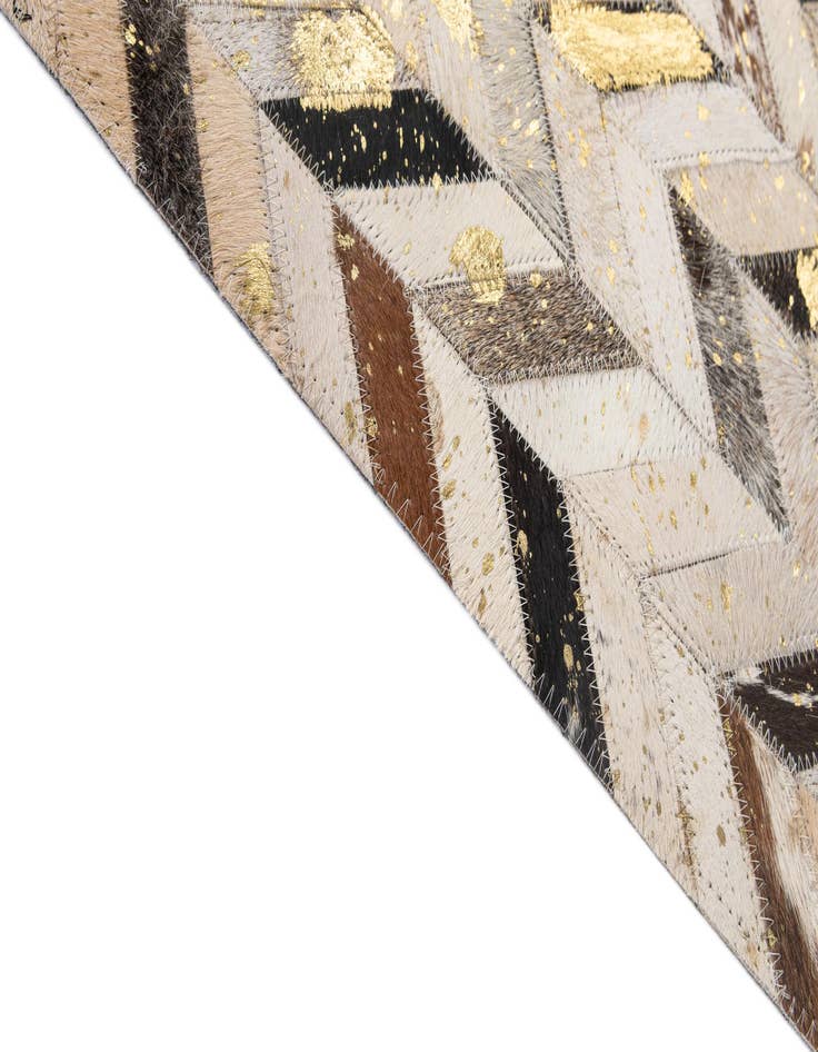 Detail image of  5' 2 x 7' 11 Cowhide - Patchwork Rug