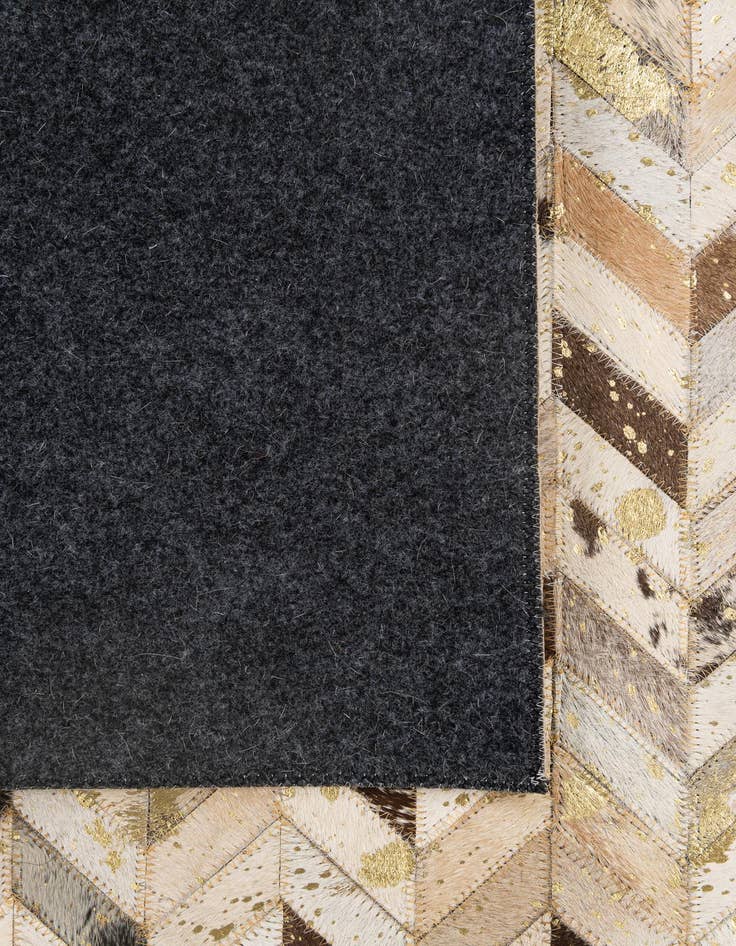 Detail image of  5' 2 x 7' 11 Cowhide - Patchwork Rug