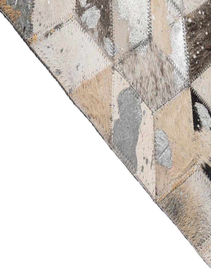 Detail image of  5' 1 x 7' 10 Cowhide - Patchwork Rug