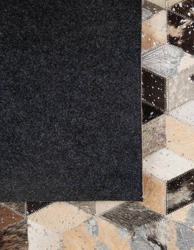 Detail image of  5' 1 x 7' 10 Cowhide - Patchwork Rug