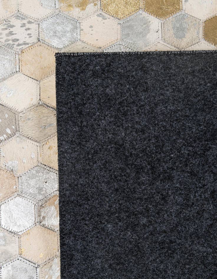 Detail image of  5' 2 x 8' 1 Cowhide - Patchwork Rug