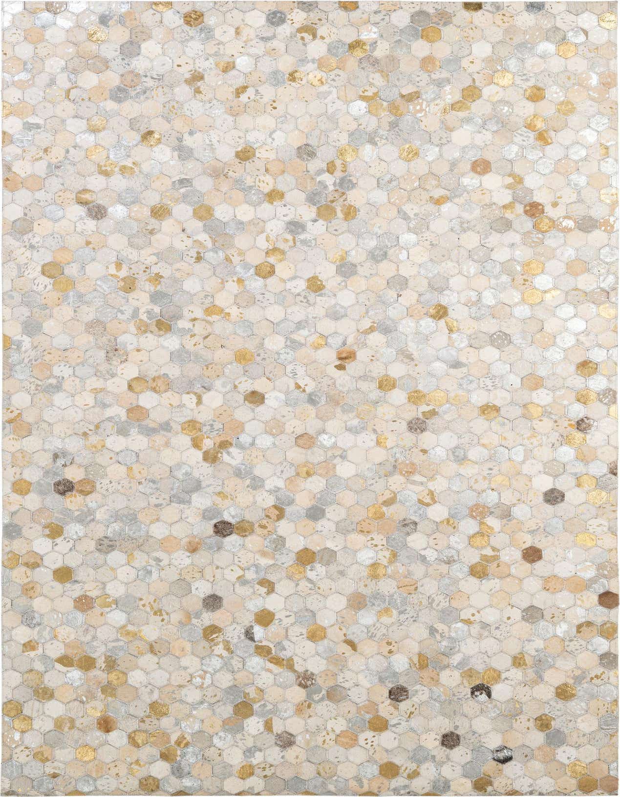 A rectangular 5x8 modern patchwork cowhide rug with multi-colored hexagonal pieces in shades of beige, gold, and silver.