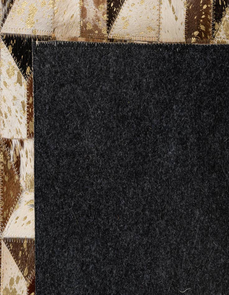 Detail image of  5' 2 x 8' Cowhide - Patchwork Rug
