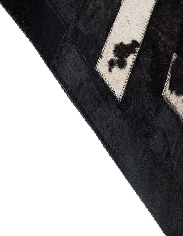 Detail image of  5' 4 x 8' 2 Cowhide - Patchwork Rug