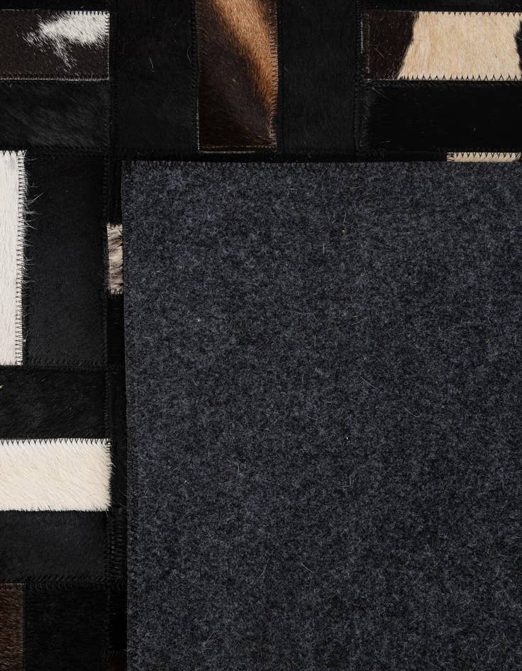 Detail image of  5' 4 x 8' 2 Cowhide - Patchwork Rug