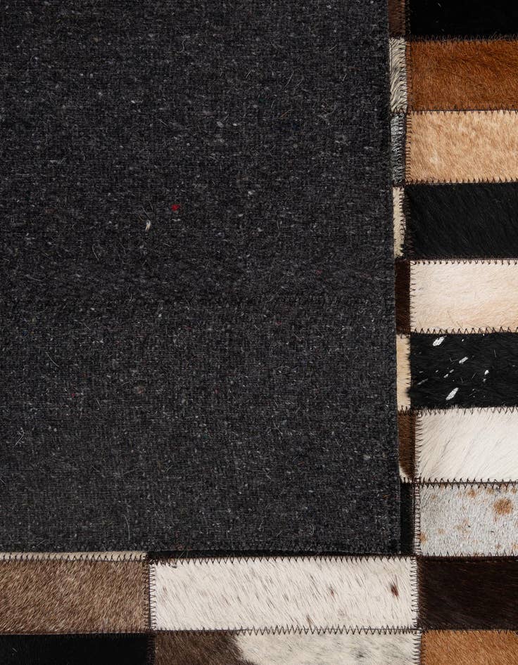 Detail image of  5' 3 x 8' 2 Cowhide - Patchwork Rug