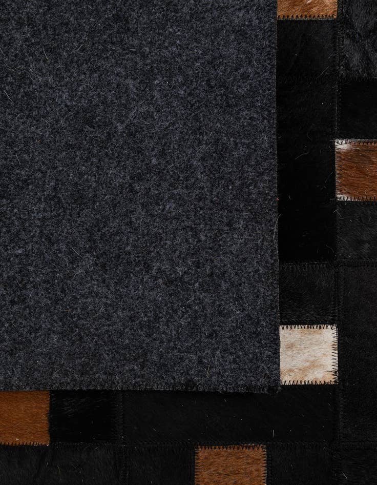 Detail image of  5' 3 x 8' 1 Cowhide - Patchwork Rug
