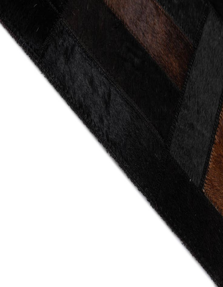 Detail image of  5' 3 x 8' 1 Cowhide - Patchwork Rug