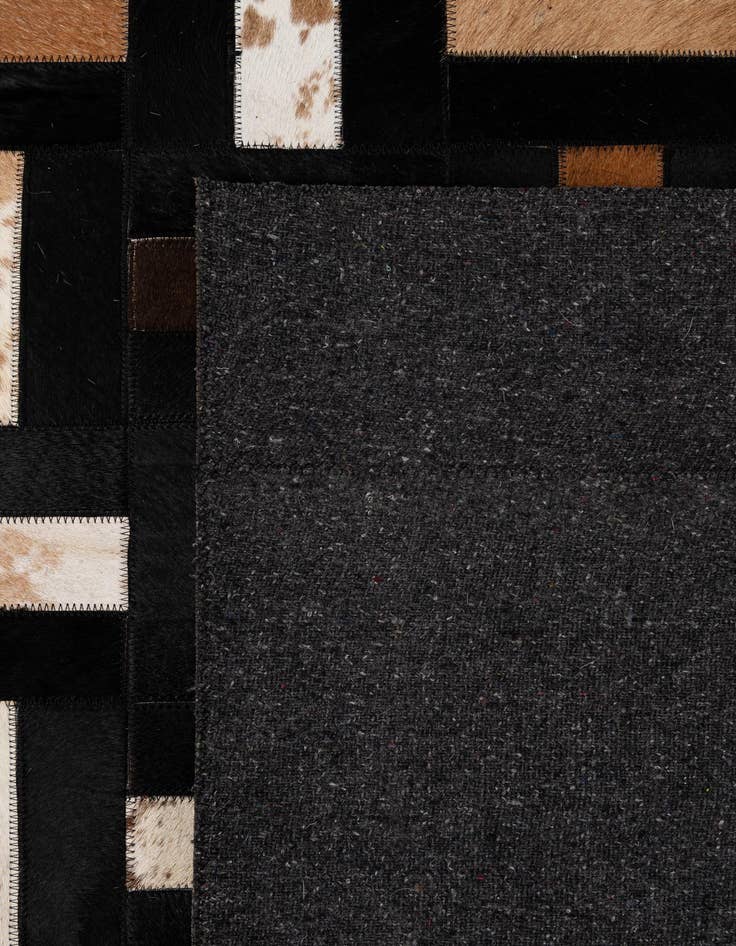 Detail image of  5' 3 x 8' 1 Cowhide - Patchwork Rug