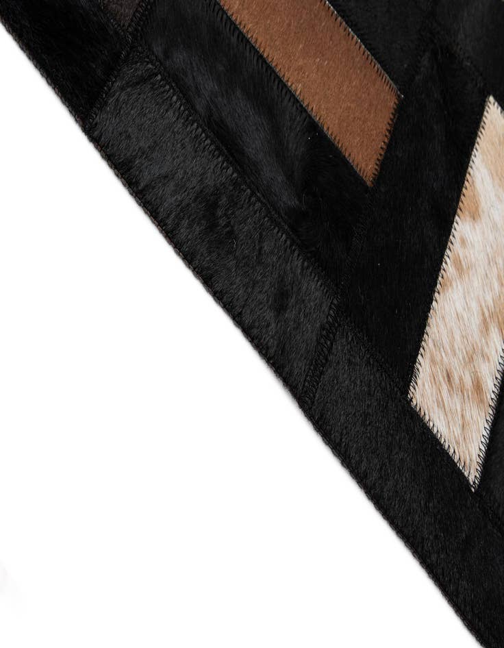 Detail image of  5' 3 x 8' 1 Cowhide - Patchwork Rug