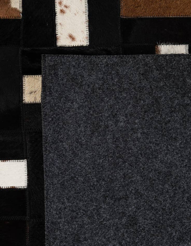 Detail image of  5' 3 x 8' 1 Cowhide - Patchwork Rug