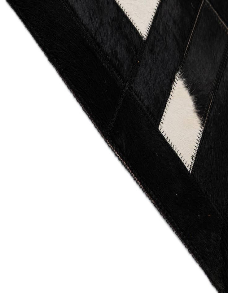 Detail image of  5' 3 x 8' 2 Cowhide - Patchwork Rug