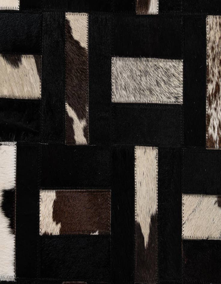 Detail image of  5' 3 x 8' 2 Cowhide - Patchwork Rug