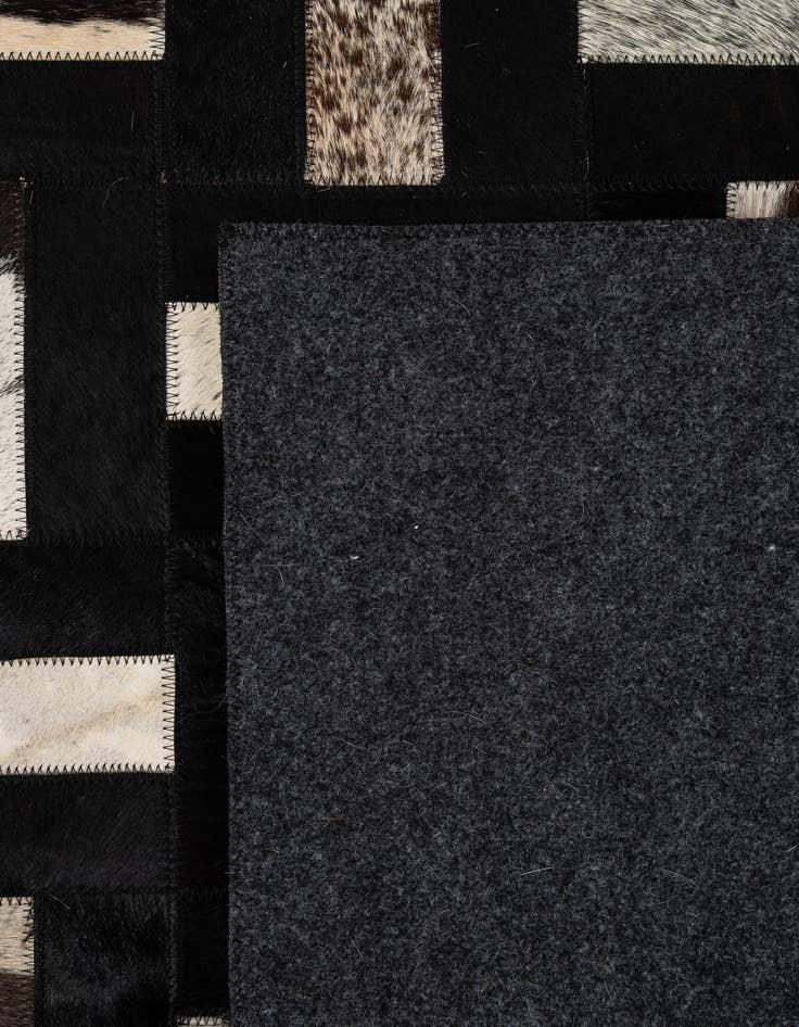 Detail image of  5' 3 x 8' 2 Cowhide - Patchwork Rug