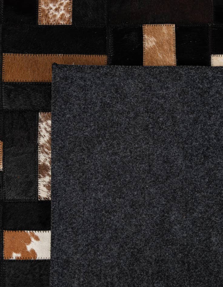 Detail image of  5' 3 x 8' 2 Cowhide - Patchwork Rug