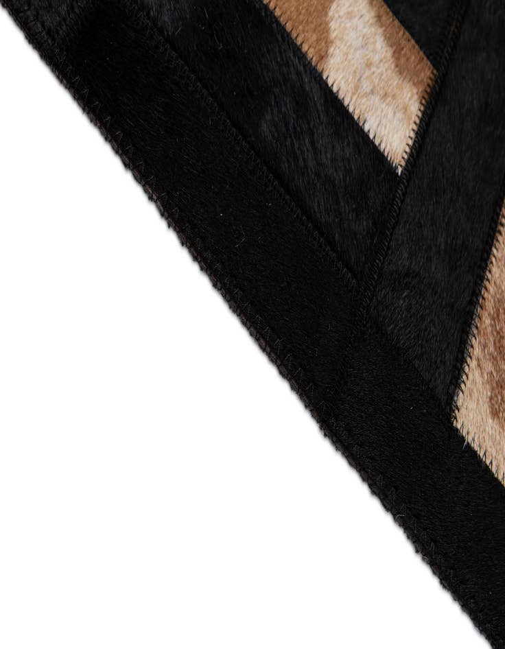 Detail image of  5' 3 x 8' 1 Cowhide - Patchwork Rug