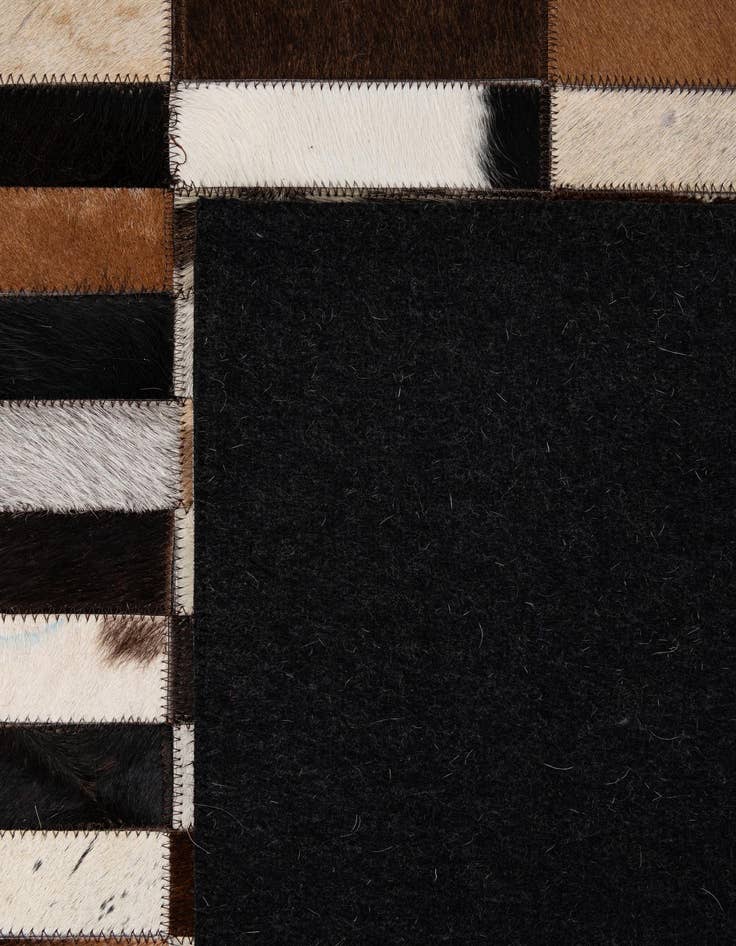 Detail image of  5' 3 x 8' Cowhide - Patchwork Rug