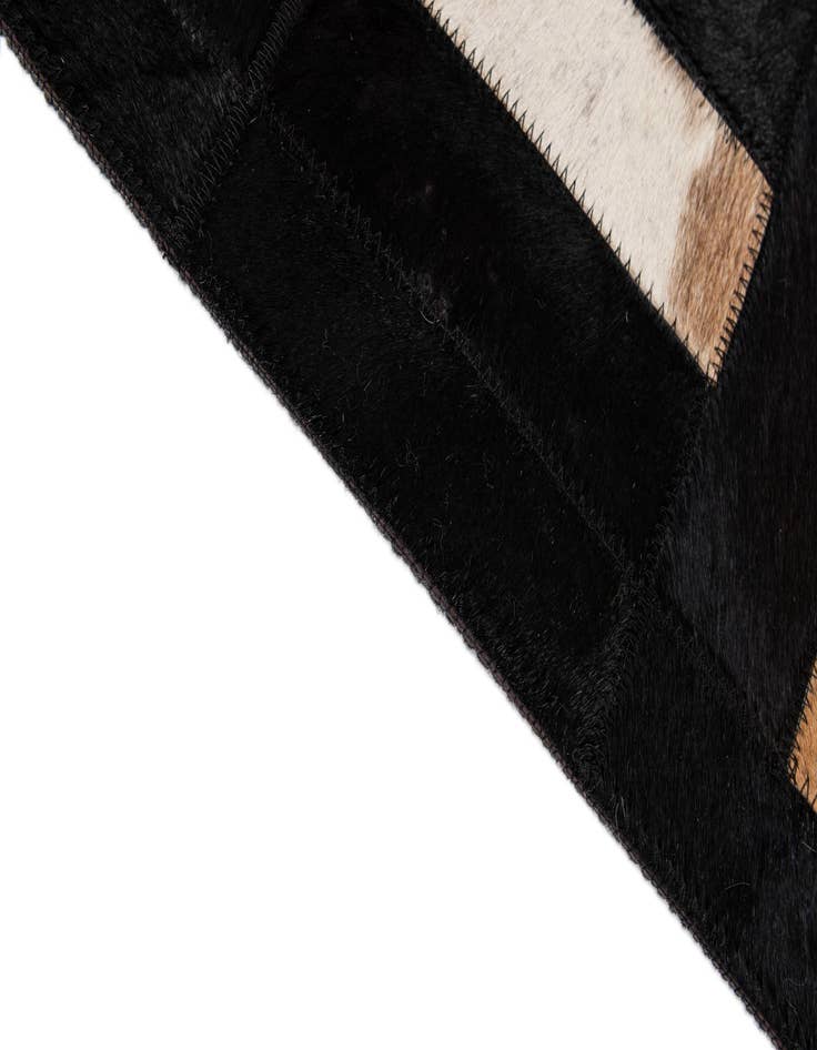 Detail image of  5' 3 x 8' 2 Cowhide - Patchwork Rug