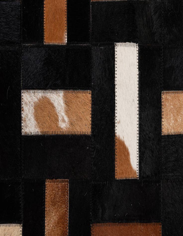 Detail image of  5' 3 x 8' 2 Cowhide - Patchwork Rug