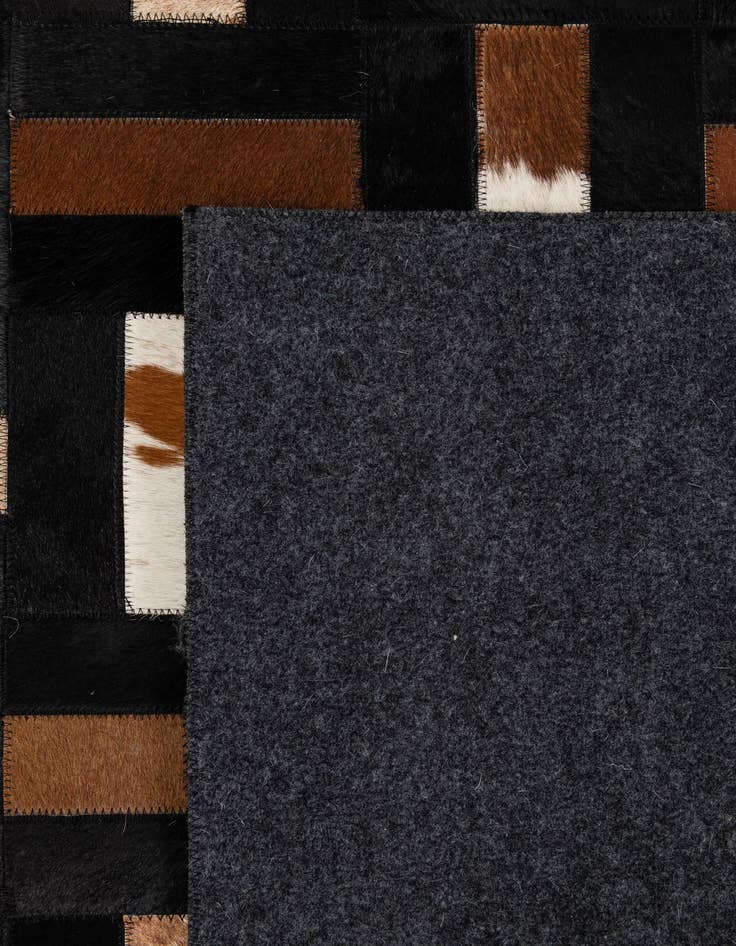 Detail image of  5' 3 x 8' 2 Cowhide - Patchwork Rug