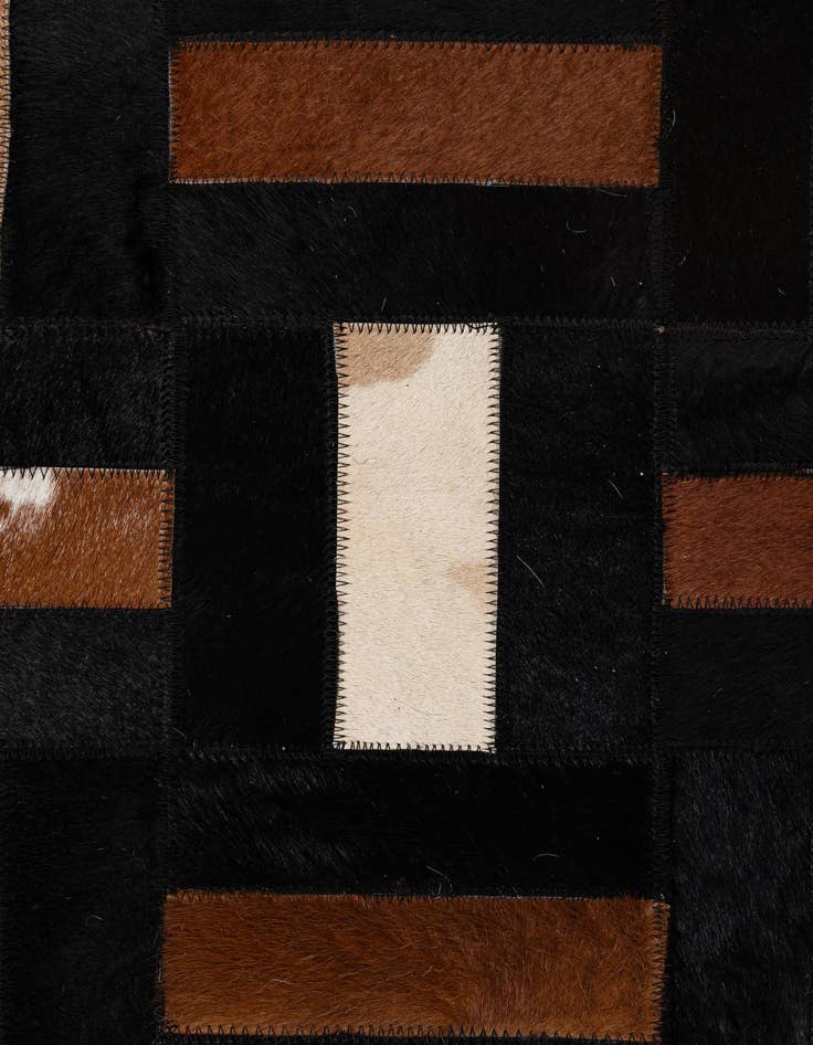 Detail image of  5' 3 x 8' 2 Cowhide - Patchwork Rug