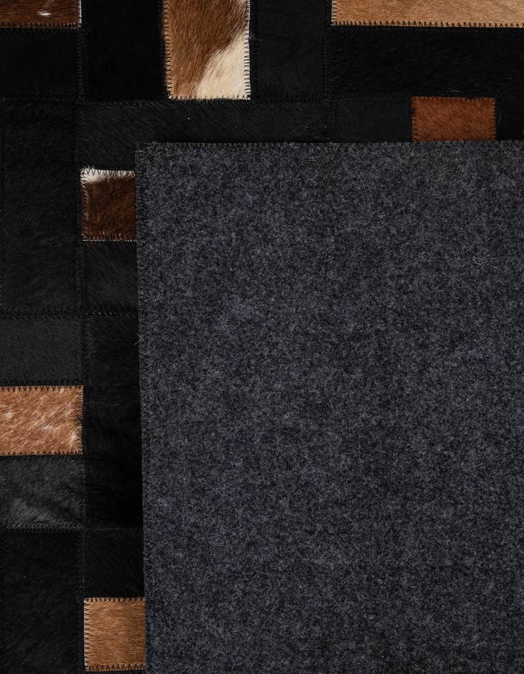 Detail image of  5' 3 x 8' 2 Cowhide - Patchwork Rug