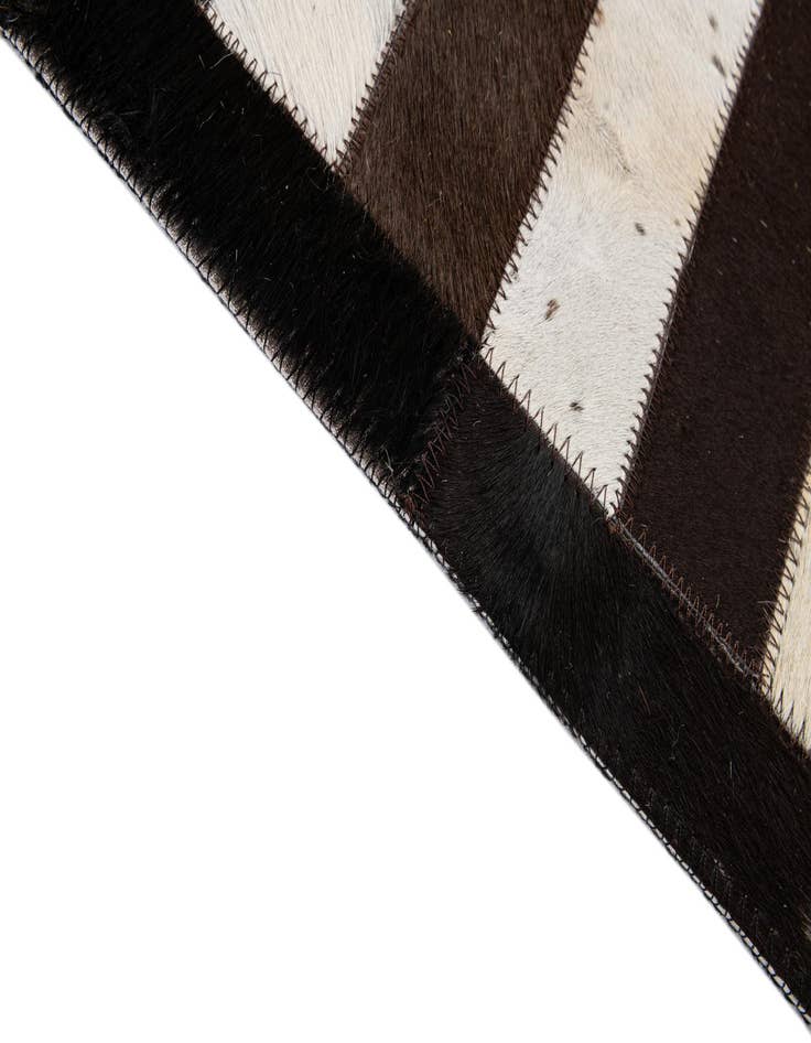 Detail image of  5' 3 x 8' 2 Cowhide - Patchwork Rug