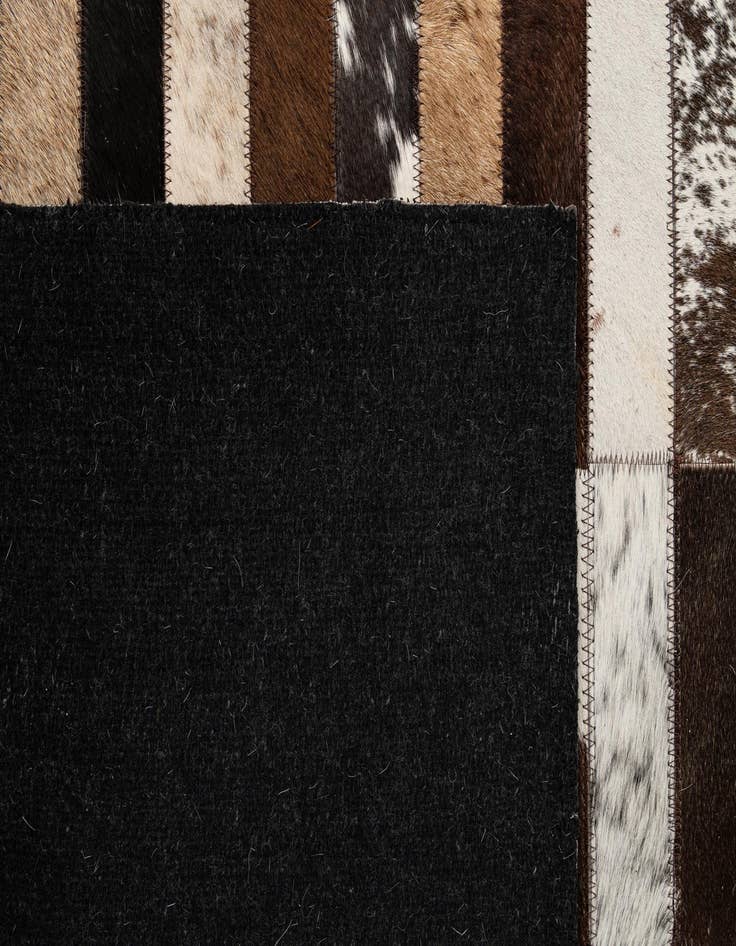 Detail image of  5' 3 x 8' 2 Cowhide - Patchwork Rug