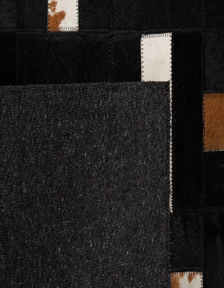 Detail image of  5' 2 x 8' 1 Cowhide - Patchwork Rug