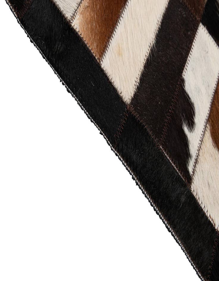 Detail image of  5' 3 x 7' 11 Cowhide - Patchwork Rug