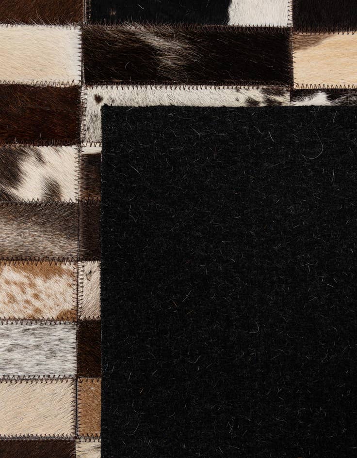 Detail image of  5' 3 x 7' 11 Cowhide - Patchwork Rug