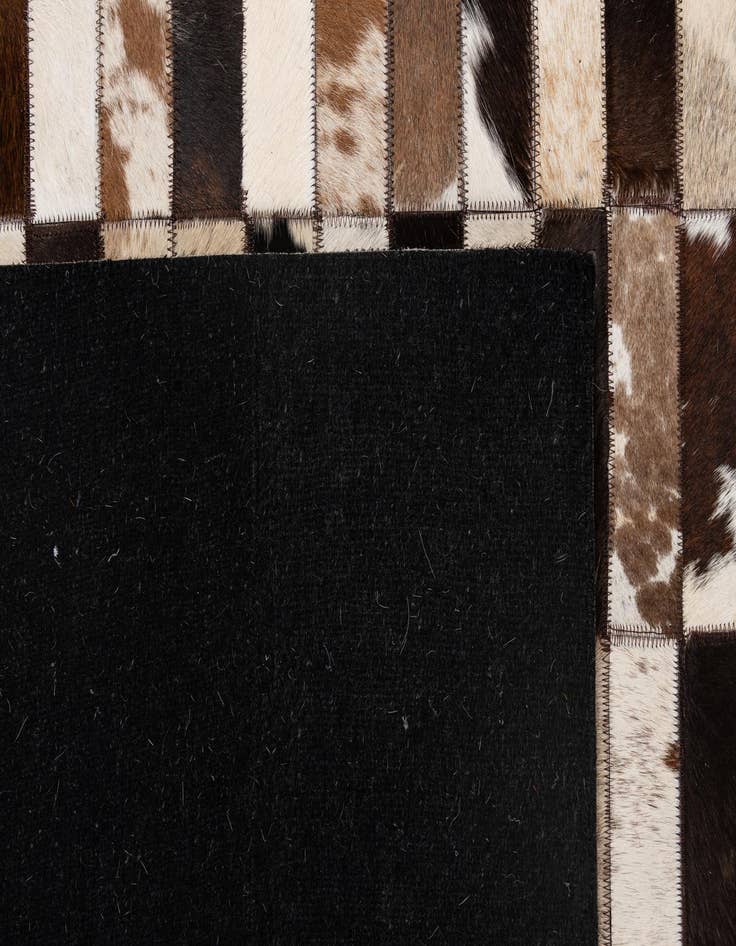 Detail image of  5' 3 x 8' 1 Cowhide - Patchwork Rug