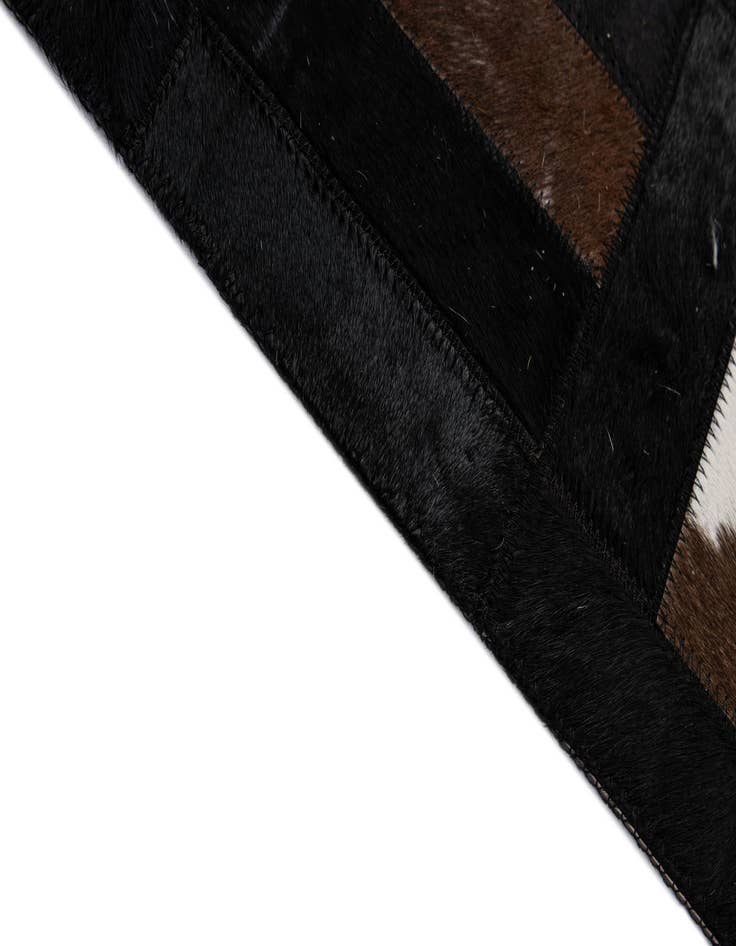 Detail image of  5' 2 x 8' 1 Cowhide - Patchwork Rug