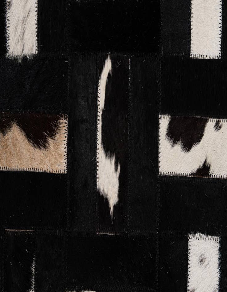Detail image of  5' 2 x 8' 1 Cowhide - Patchwork Rug