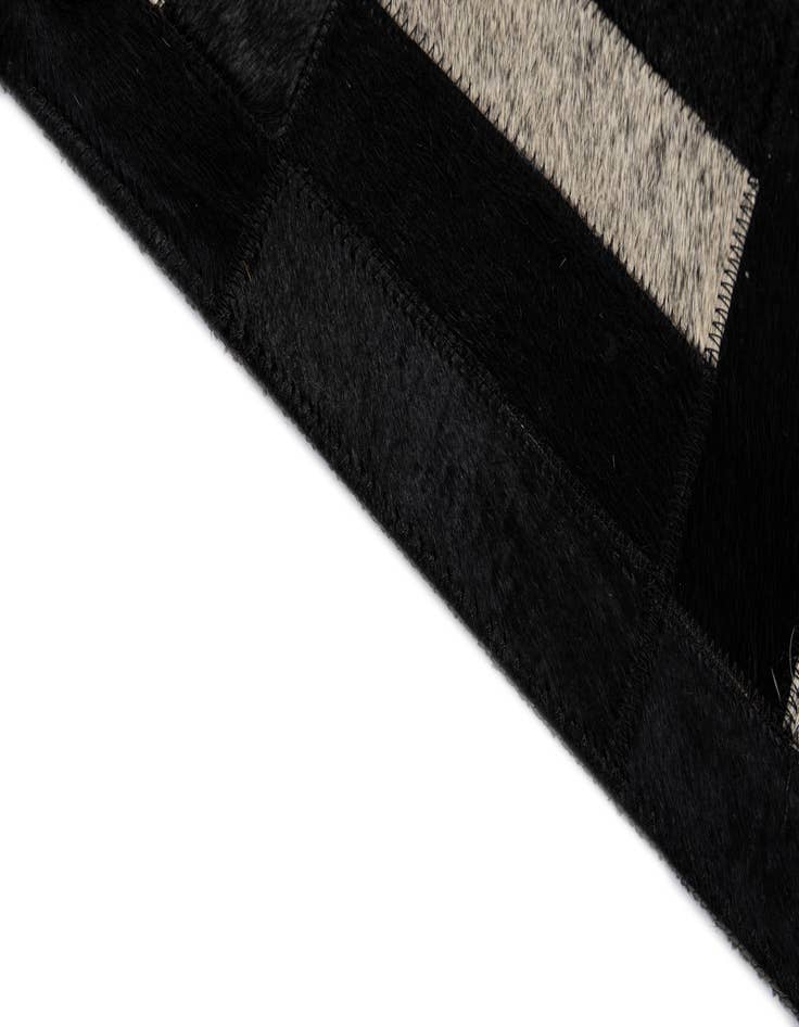 Detail image of  5' 3 x 8' 2 Cowhide - Patchwork Rug