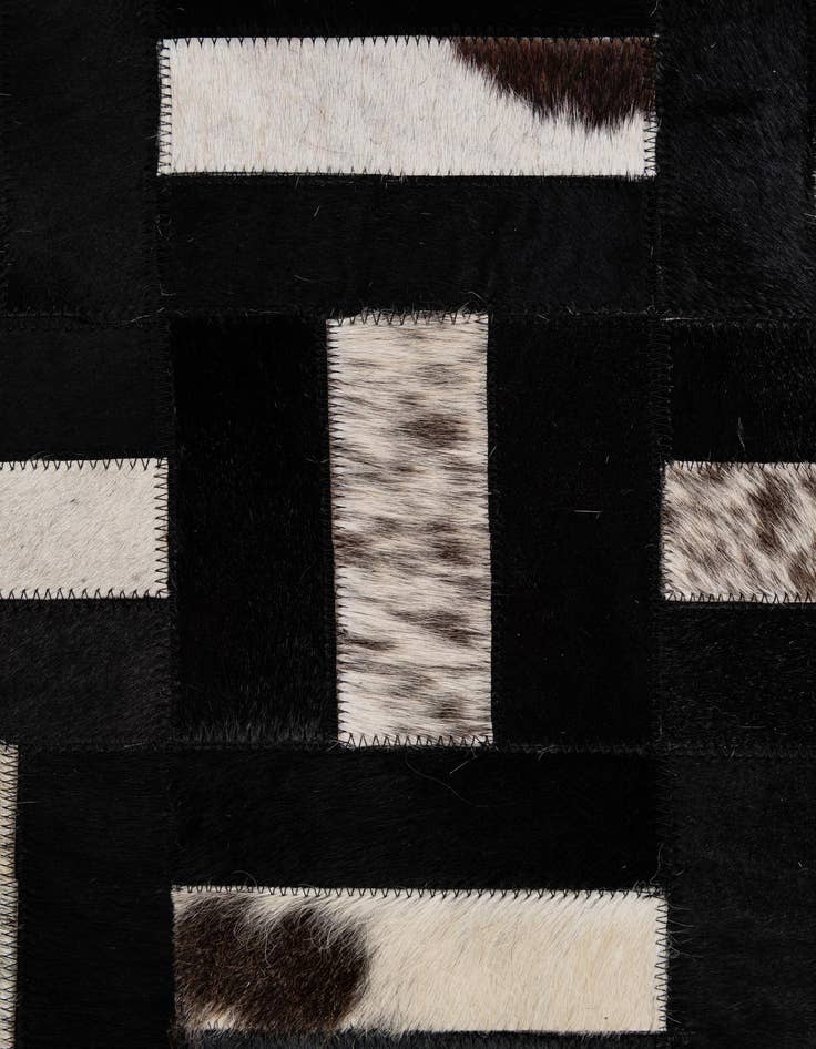 Detail image of  5' 3 x 8' 2 Cowhide - Patchwork Rug