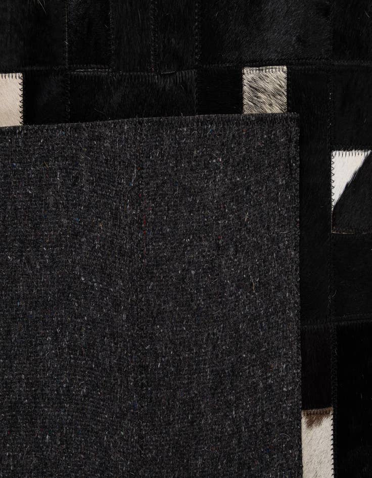 Detail image of  5' 3 x 8' 2 Cowhide - Patchwork Rug