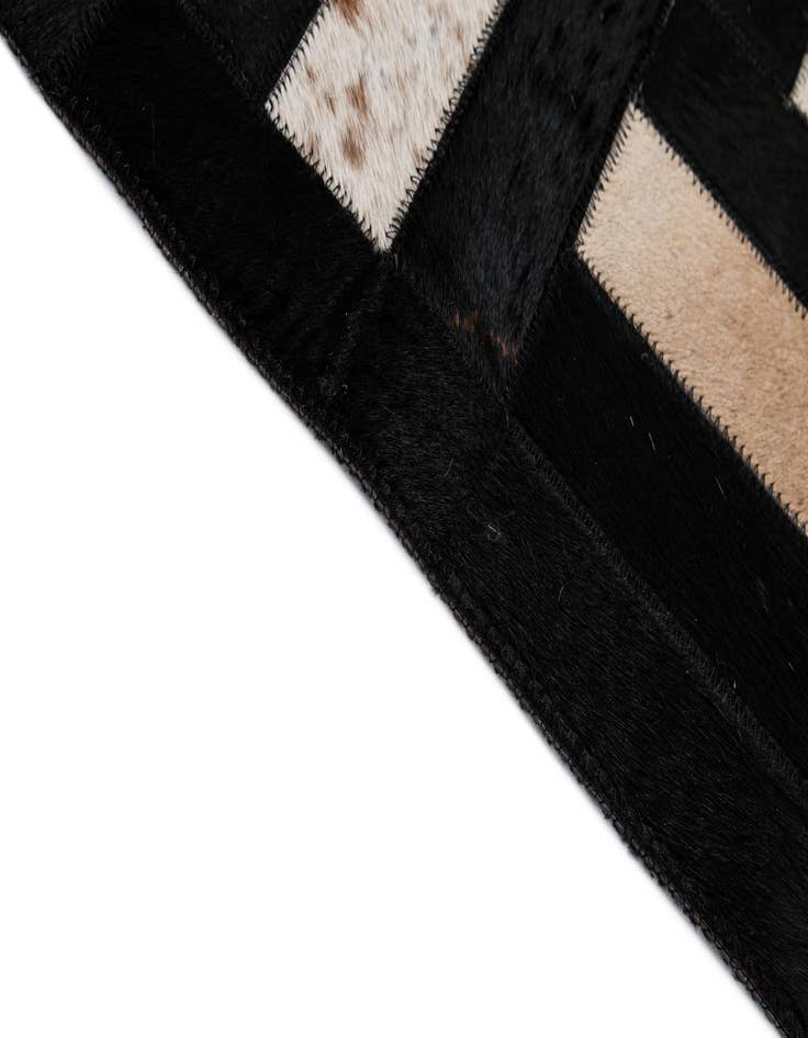 Detail image of  5' 3 x 8' 1 Cowhide - Patchwork Rug