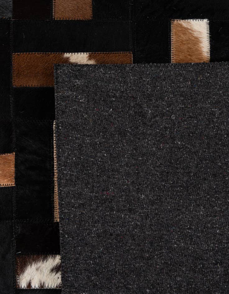 Detail image of  5' 3 x 8' 1 Cowhide - Patchwork Rug